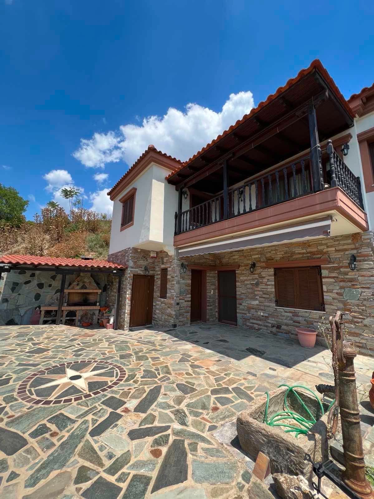 Stone residence courtyard in Maroneia