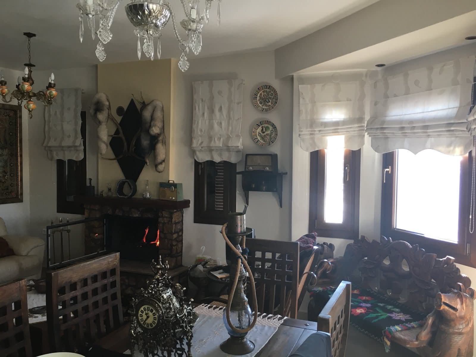 Living room and stone fireplace